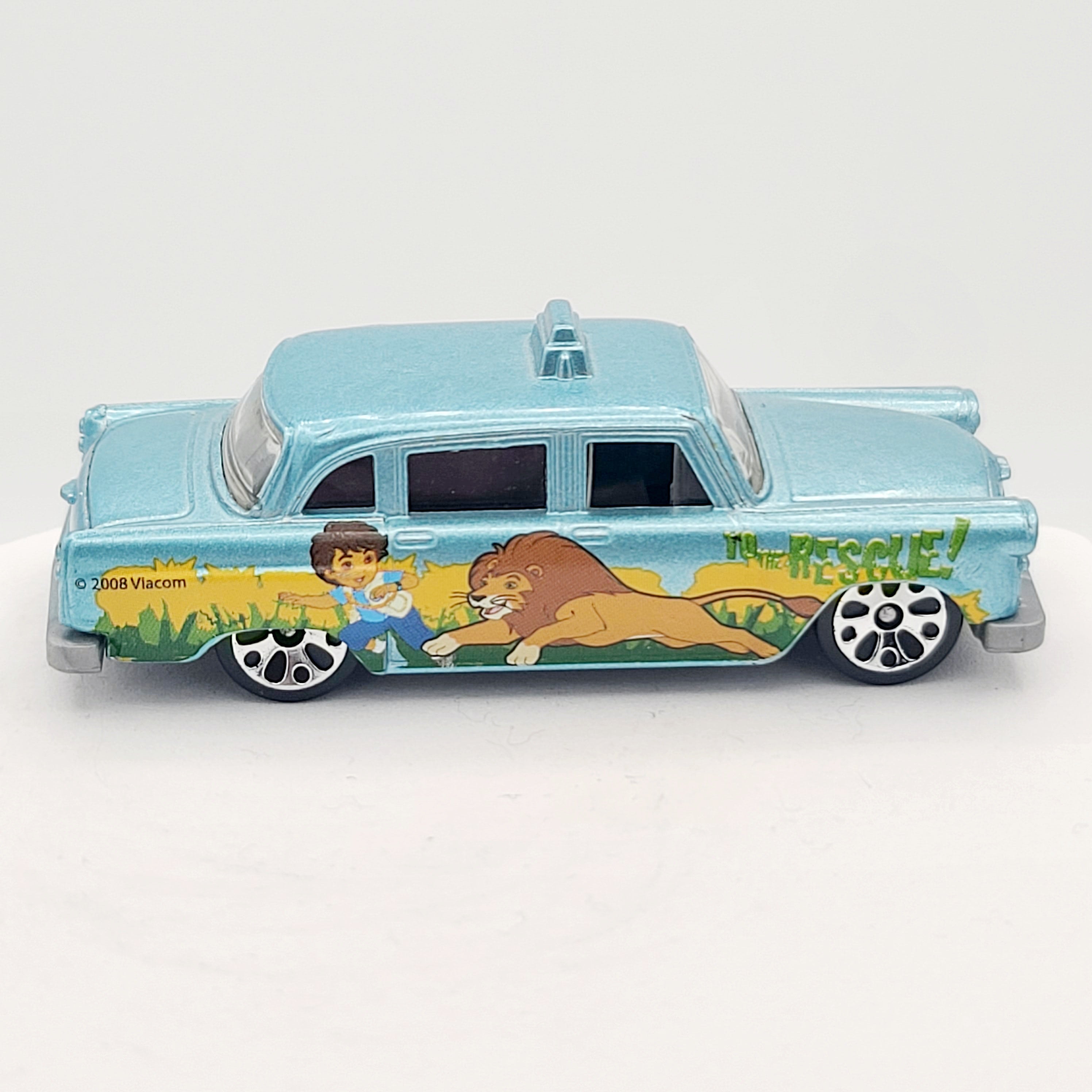 Matchbox Checker Cab "Go Diego Go" (2009 MBX 2 Pack Exclusive - Easter Rides)